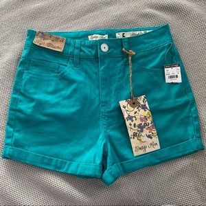 Teal denim shorts from Indigo Rein. Size 5.